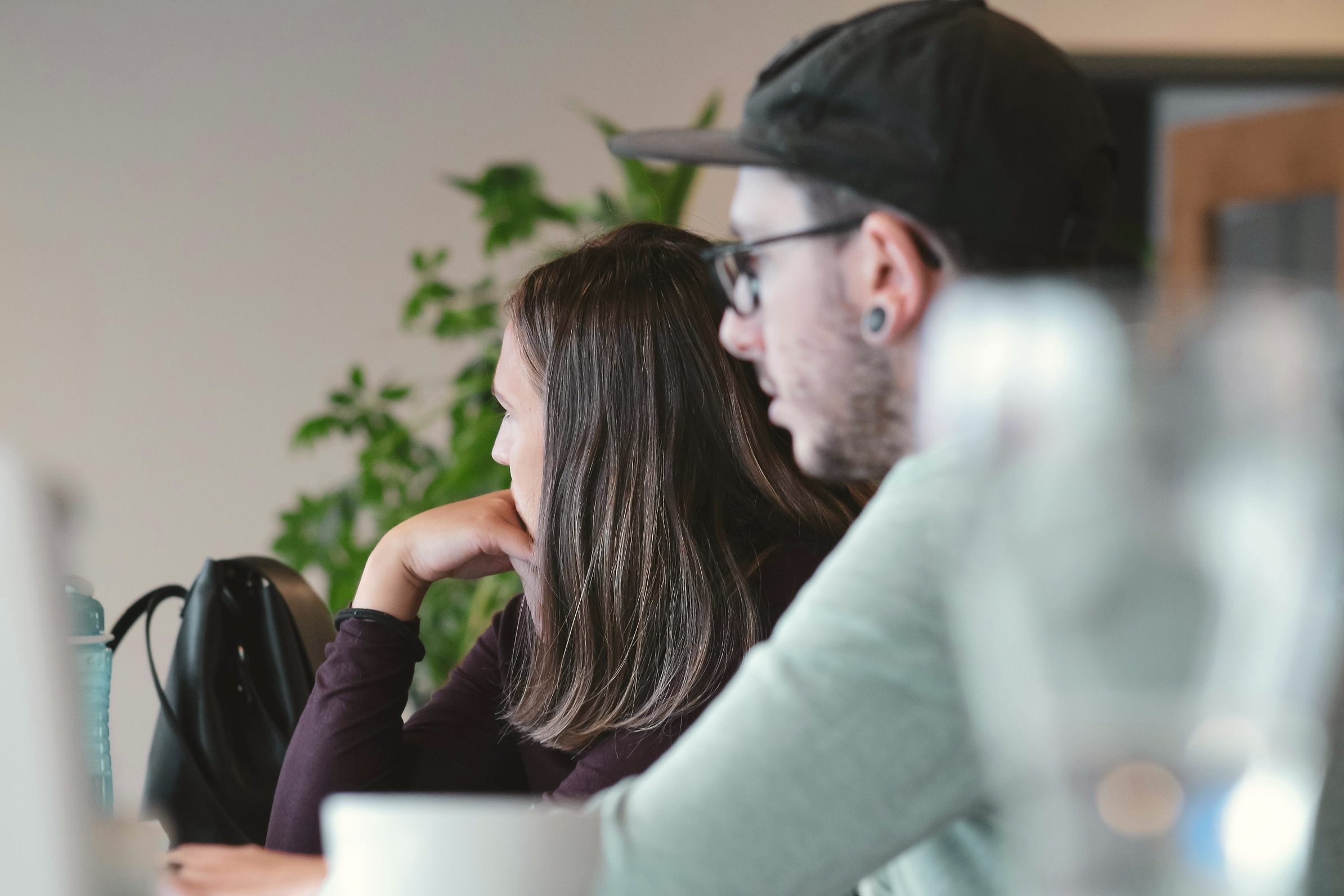 Colleagues collaborating at a computer.