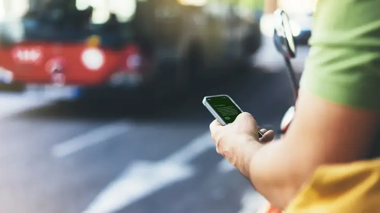 man holding a smart phone in his hand